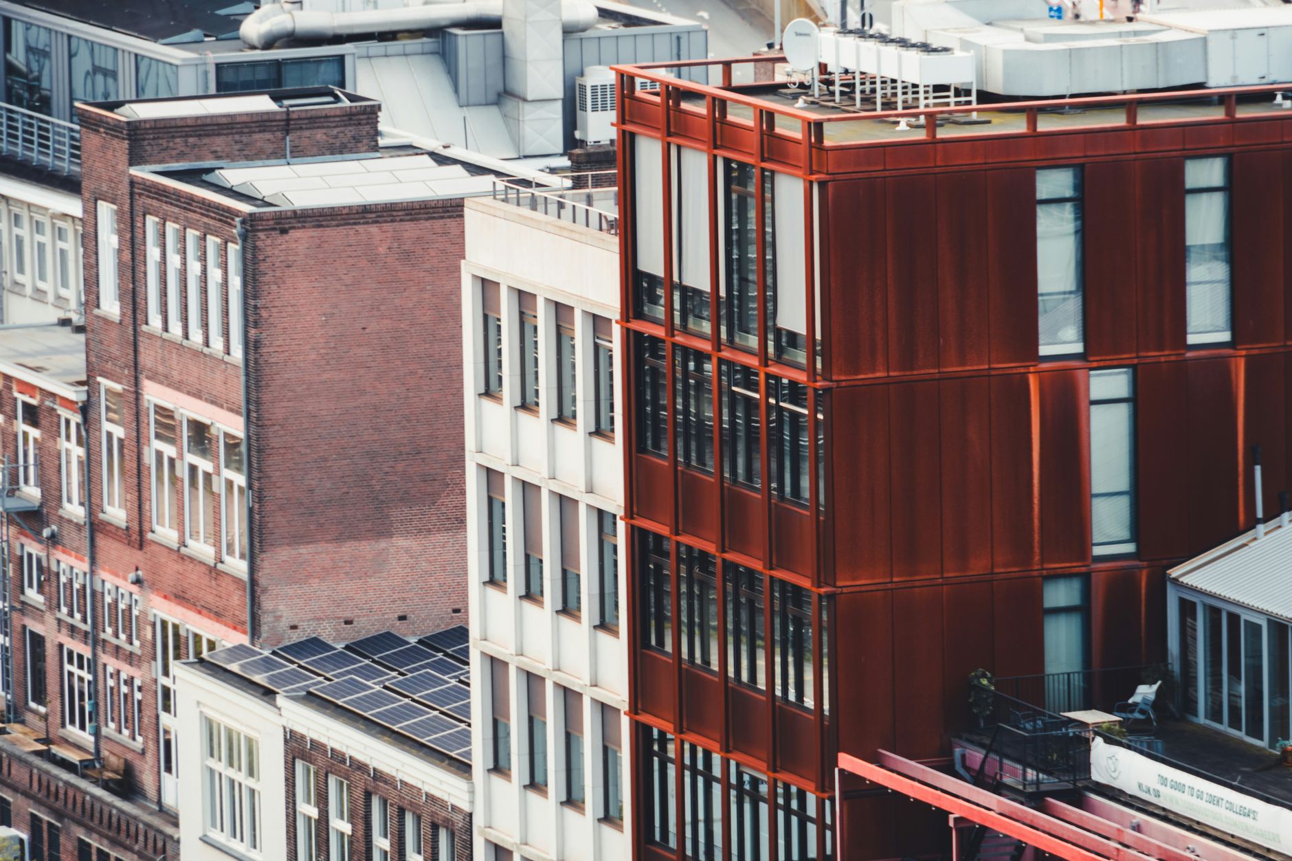 Brick and copper-coloured city buildings