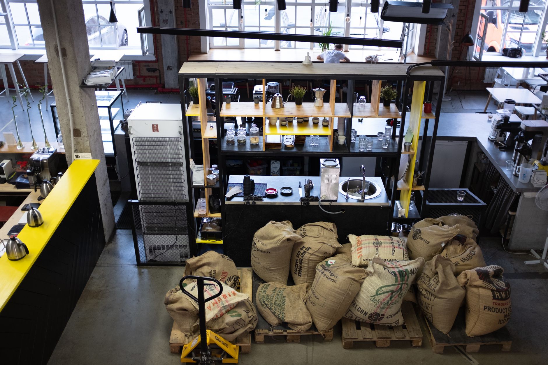 Coffee counter, kettle and sacks of beans